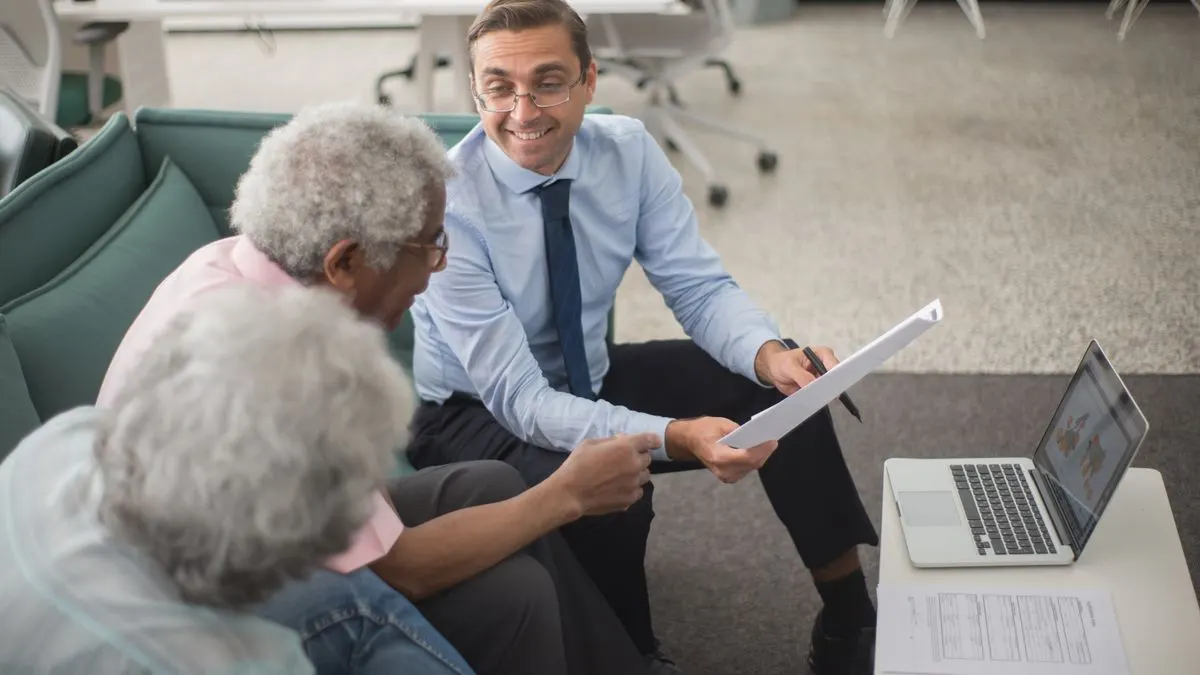 Advisor explaining installment loan options and monthly payments to Canadian clients